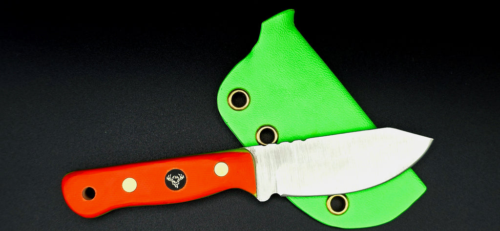 Ready to ship EDH! High vis hunter orange w/green liners and green sheath.