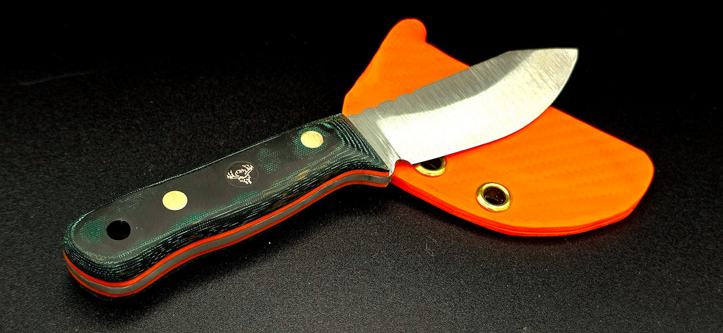 Ready to ship EDH! Beautiful green micarta with orange liners and orange sheath.