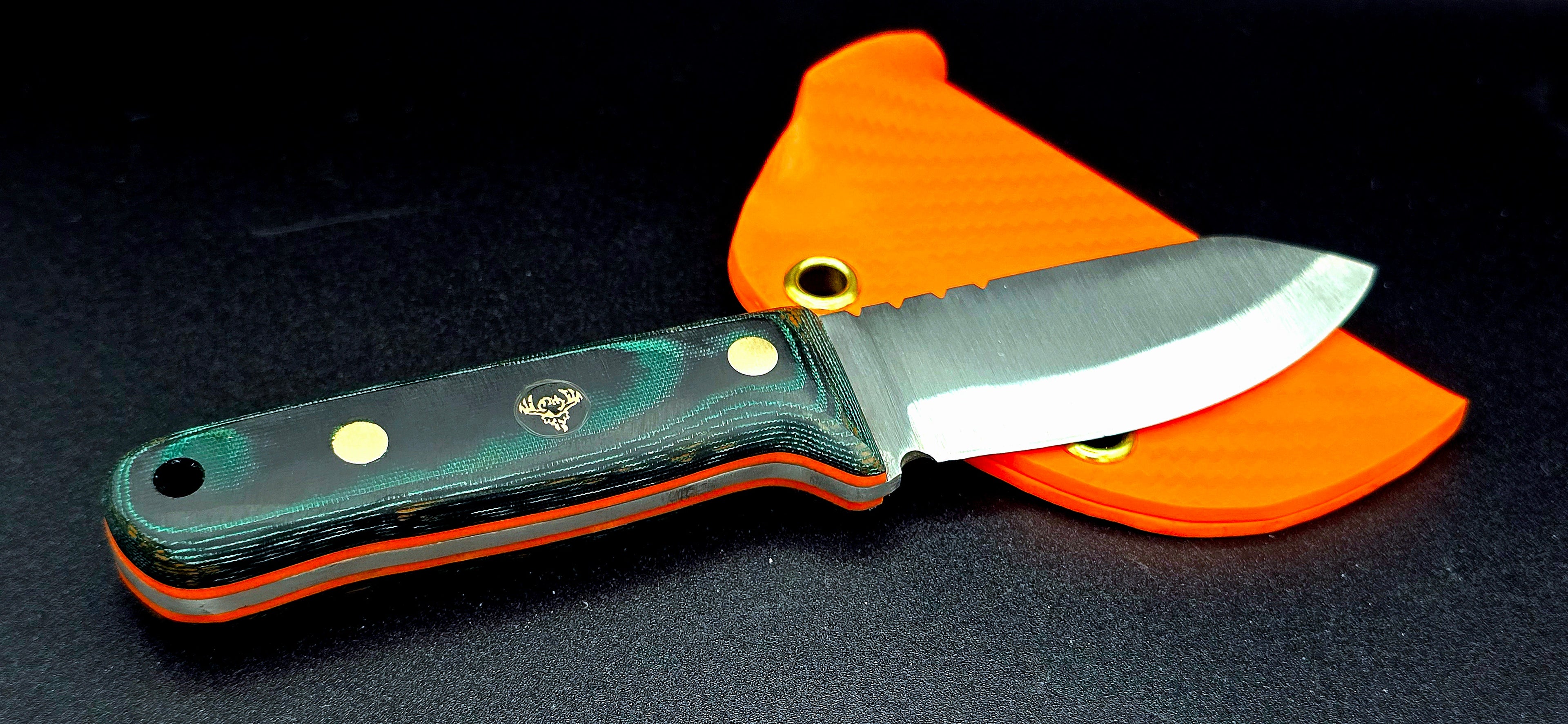 Ready to ship EDH! Beautiful green micarta with orange liners and orange sheath. Nitro-V 62HRC